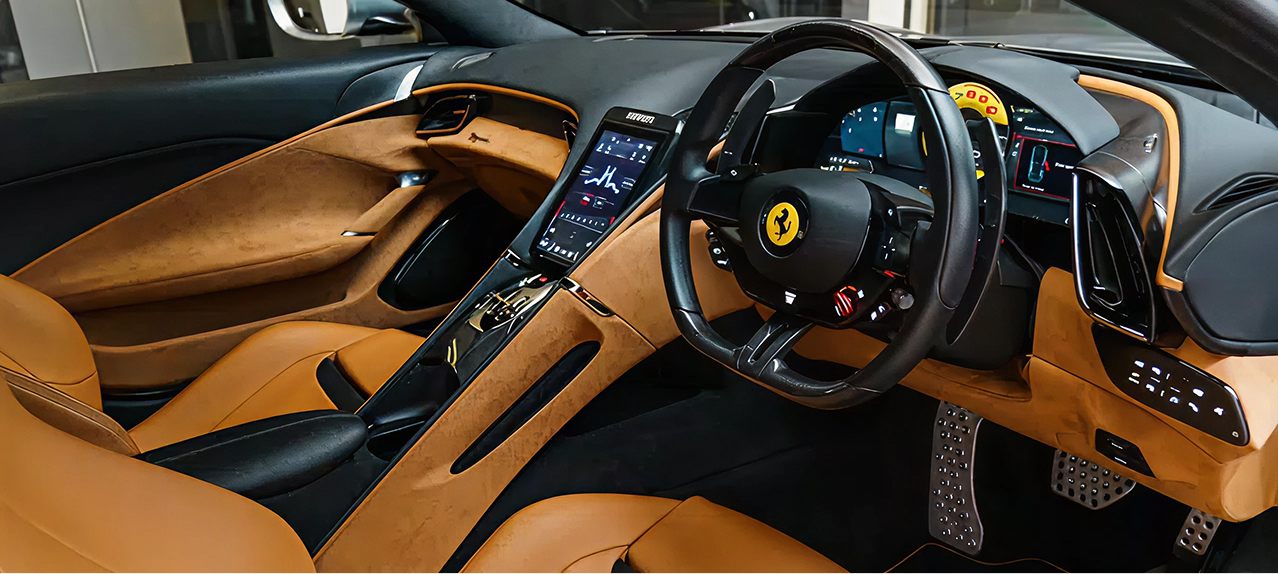 Ferrari interior showing infotainment system