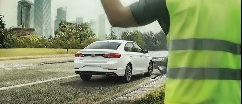 Roadside technician fitting a new car battery to a Geely
